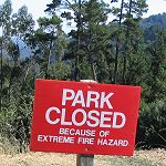 sign reading 'Park closed because of extreme fire hazard'