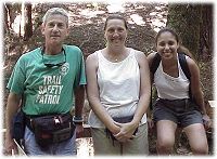 a Volunteer Hiking Patrol member with visitors in Redwood Regional Park